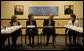 President George W. Bush participates in a meeting on health care Wednesday, Dec. 5, 2007, during a visit to the OneWorld Community Health Centers, Inc. in Omaha. Said the President afterwards, "This center serves -- 85 percent of its people don't speak English as a first language. By far, the vast majority are low-income. And yet they're receiving first-class quality care. So I thank the docs and the nurses and the social workers, and all the people who are making this facility such a good one."  White House photo by Chris Greenberg