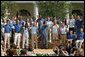 President George W. Bush joined by the members of the 2008 United States Summer Olympic Team wave to the crowd during a photo opportunity Monday, July 21, 2008, in the Rose Garden of the White House.  White House photo by Shealah Craighead