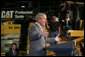 President George W. Bush gestures as he speaks to workers at Caterpillar Inc. in East Peoria, Ill., Tuesday, Jan. 30, 2007, on the strength of the U.S. economy.  White House photo by Paul Morse