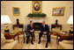 President George W. Bush meets with Colombian President Alvaro Uribe Saturday, Sept. 20, 2008, in the Oval Office of the White House. White House photo by Eric Draper