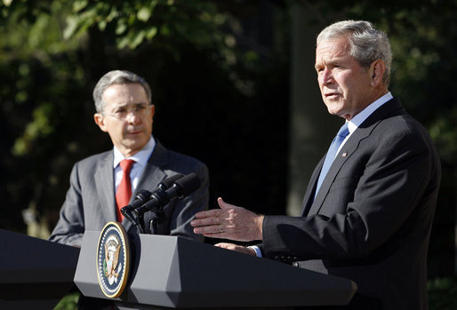 President George W. Bush gestures as he delivers his remarks during a joint press availability with Colombian President Alvaro Uribe Saturday, Sept. 20, 2008, in the Rose Garden at the White House. White House photo by Eric Draper