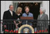 Mrs. Laura Bush, joined by President George W. Bush, daughter, Jenna, and former first lady Barbara Bush, welcomes guests Monday, March 24, 2008 to the South Lawn of the White House, for the 2008 White House Easter Egg Roll.