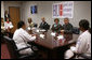 Mrs. Laura Bush participates in a roundtable at the Howard University Center for Infectious Disease Management and Research Tuesday, June 19, 2007, in Washington, D.C. Pictured with Mrs. Bush is, from left, Dr. Celia Maxwell, Director of the Women’s Health Initiative, D.C. Mayor Adrian Fenty and Dr. Tony Fauci, Director of the National Institute of Allergy and Infectious Diseases, National Institutes of Health. Dr. Maxwell invited experts to discuss HIV/AIDS and voluntary HIV testing. Howard University hospital, which is the first facility to implement throughout its entire institution voluntary HIV testing as part of routine medical care. White House photo by Shealah Craighead