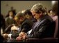 President George W. Bush prays during a church service honoring Dr. Martin Luther King, Jr. at the First Baptist Church of Glenarden in Landover, Md., Jan. 20, 2003. "It is fitting that we honor this great American in a church because, out of the church comes the notion of equality and justice," said the President in his remarks. White House photo by Eric Draper.