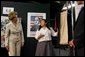 Laura Bush looks at costumes designed by members of the Will Power to Youth program before watching a performance of "Romeo and Juliet" at the Shakespeare Festival/LA's theater in Los Angeles April 26, 2005. Students in the program write their own versions of Shakespeare's plays, create the music, costumes and construct the sets for each production. White House photo by Krisanne Johnson