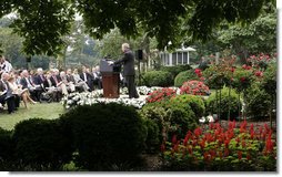 President George W. Bush speaks with reporter’s Wednesday morning, June 14, 2006, during a news conference in the Rose Garden, following his trip to Iraq where he met with members of the Iraq government and U.S. troops. White House photo by Paul Morse