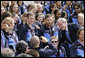 President George W. Bush poses for a photo after delivering congratulatory remarks to the 2006 U.S. Winter Olympic and Paralympic teams during a ceremony held on the South Lawn of the White House Wednesday, May 17, 2006. White House photo by Eric Draper