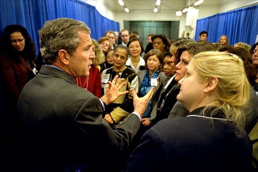 President George W. Bush meets with participants of the women's entrepreneurship in the 21st Century Summit at the Ronald Reagan Building and International Trade Center, Washington, D.C., Tuesday, March 19. During his visit, the President unveiled plans to help small businesses across the country. "You can dream big dreams in America, and my job as the President is to make sure that if you've got a good idea, you can realize those dreams," said the President. White House photo by Paul Morse.