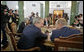 President George W. Bush talks with Russian President Vladimir Putin during a working session at the G8 Summit in Strelna, Russia, Sunday, July 16, 2006. White House photo by Eric Draper