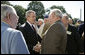 President George W. Bush welcomes veterans of the 57th Bomb Wing from World War II to the White House, Friday, Oct. 13, 2006. Approximately 10,800 airmen passed through the portals of the 57th Bomb Wing, a command composed of B-25 Mitchell medium bombers, during its time in combat from 1942 to 1945 in North Africa, Sicily, Corsica, and Italy. The B-25 Mitchell’s and their crews were known for their ability to take out bridges, gun positions, and for disrupting enemy troop communications. The 57th was nicknamed, "The Bridge Busters." The members are in Washington, D.C., for their association's annual reunion Oct. 11-16, 2006. White House photo by Eric Draper