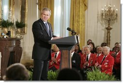 President George W. Bush speaks during a ceremony honoring African American History Month Tuesday, Feb. 8, 2005. "In the 1920s, Dr. Woodson argued that if African Americans were to take their rightful place in society, young Americans of all races needed to learn about the black contribution to our history and culture. So in 1926, he launched the first black history week. Today, a movement that began in black churches and schoolrooms is observed all across America -- including the White House. Welcome," said the President.   White House photo by Paul Morse