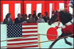 Prime Minister Junichiro Koizumi, far left, President George W. Bush, left, Laura Bush, second right, and Kiyoko Fukuda, far right, wife of the Japanese chief cabinet secretary, watch a demonstration of horseback archery during a visit to the Meiji Shrine in Tokyo, Monday, Feb. 18. White House photo by Susan Sterner.