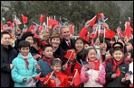 The President and Mrs. Bush pose with a group of Chinese children at the Great Wall of China in Badaling about an hour outside of Beijing, Friday, February 22, 2002. The children waved flags and sang for the Bushes. White House photo by Susan Sterner.