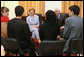 Mrs. Laura Bush is joined by Afghan Foreign Minister Rangeen Dadfar Spanta, center right, for a meeting with Afghan teachers and students, Sunday, June 8, 2008, during an unannounced visit to Kabul. Attending the meeting were representatives from Kabul University, American University of Afghanistan, International School of Kabul and the Women's Teacher Training Institute. White House photo by Shealah Craighead