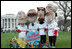 The Presidential character mascots of the Washington Nationals baseball team, Thomas Jefferson, Teddy Roosevelt, Abraham Lincoln and George Washington participate Monday, March 24, 2008 on the South Lawn of the White House, at the 2008 White House Easter Egg Roll.