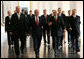 President George W. Bush walks with Czech Republic Prime Minister Mirek Topolanek, right, and President Vaclav Klaus Tuesday, June 5, 2007, during a visit to Prague Castle in Prague, Czech Republic. "It is fitting that we meet in the Czech Republic -- a nation at the heart of Europe, and of the struggle for freedom on this continent," said President Bush in his remarks. "Nine decades ago, Tomas Masaryk proclaimed Czechoslovakia's independence based on the 'ideals of modern democracy'." White House photo by Eric Draper