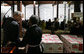 President George W. Bush talks with 85-year-old Doris Lewis Monday, Nov. 19, 2007, during a stop at the Central Virginia Community Food Bank in Richmond, Va. "You have a sweet heart," the President told the volunteer, who was celebrating her birthday at the warehouse. White House photo by Chris Greenberg