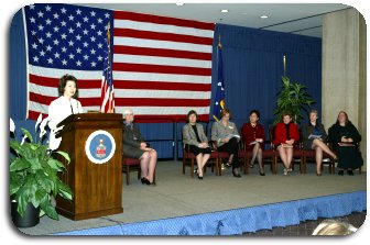 Picture of Secretary Elaine L. Chao with the women Presidential Appointees at the DOL Women's History Month Event on March 28, 2003