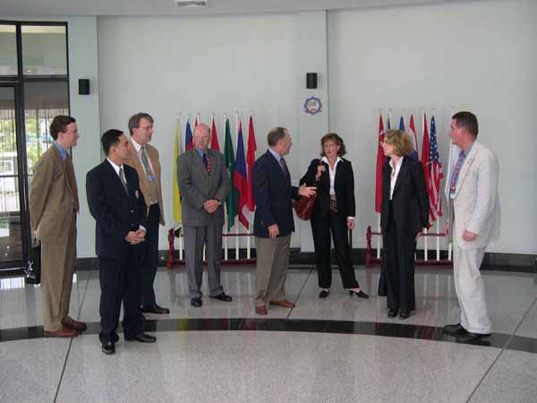 Deputy Assistant Secretary of State for the Environment Claudia McMurray and members of the delegation to the CITES COP 13 are briefed by the Program Director of the International Law Enforcement Academy (ILEA), Bangkok, Thailand, October 8, 2004