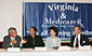 Secretary Chao (center right) and Health and Human Services Secretary Mike Leavitt (right) along with Clayton Fong of the National Asian Pacific American Center on Aging (left) and Janet Riddick, Director of the Center on Elder Rights (center left).