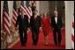 President George W. Bush walks with Judge John Roberts, his wife, Jane Marie Sullivan Roberts, and Associate Justice John Paul Stevens to the East Room of the White House Thursday, Sept. 29, 2005, where Judge Roberts was sworn in as Chief Justice of the United States.  White House photo by Paul Morse