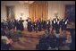 The Show Choir from the Duke Ellington School of the Arts performs for President George W. Bush at the Celebration of African American Music, History, and Culture in the East Room May 28. "The music and culture of Black Americans has brought great beauty into this world. Today it brings great pride to our country," said the President.  