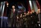 President George W. Bush addresses the 85th Annual American Legion Convention in St. Louis, Mo., Tuesday, Aug. 26, 2003. "In the 20th century, the American flag and the American uniform stood for something unique in history," President Bush said in his remarks. "America's armed forces humbled tyrants and raised up and befriended nations that once fought against us."  White House photo by Paul Morse