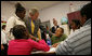 President George W. Bush spends time with students at the Waldo C. Falkener Elementary School Wednesday, Oct. 18, 2006, in Greensboro, N.C. The President visited with third- and fifth-graders before delivering his remarks on the No Child Left Behind Act. White House photo by Paul Morse