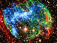 Composite image of supernova remnant W49B showing a barrel-shaped nebula.