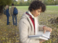 Photo of a student reading a book.