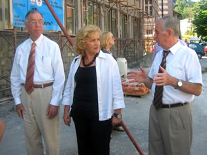 JSDP Administrator Eugene Murret (l) and translator listen as Court President Hajrudin Halilovic (r) discusses improvements to the court.