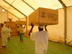 As dock workers offload USAID’s contribution of wheat, bagging machines bag the food for eventual distribution to beneficiaries in Darfur.