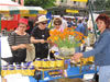 Customers look over the products at Fourth Annual International Festival of Tea and Medicinal Herbs held in Sarajevo