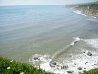 Waves break south of Whites Point