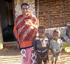 Photo of 40 year-old Mwanaisha Mzee and her 2 youngest sons (the older boy is wearing a bracelet made from flip-flops).