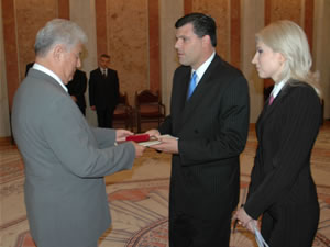 President Vladimir Voronin awarded USAID's Brock D. Bierman (right) with the Medal of Civic Merit for his long-standing support of Moldova's democratization efforts