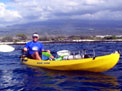 Eric Grossman surveying the shallow waters of the near-shore by kayak.