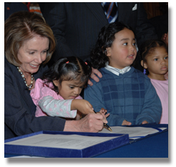 Signing the Head Start legislation