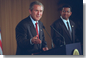 President George W. Bush and El Salvador's President Francisco Flores (right) hold a joint press conference in San Salvador, El Salvador, March 24, 2002. "El Salvador is one of the really great stories of economic and political transformation of our time. Just over a decade ago, this country was in civil war," said the President in his remarks. "The country has renewed its commitment to democracy and economic reform and trade. It is one of the freest and strongest and most stable countries in our hemisphere." White House photo by Eric Draper.