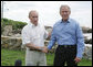 President George W. Bush and President Vladimir Putin of Russia, shake hands at the end of their joint press availability Monday, July 2, 2007, at Walker's Point in Kennebunkport, Me. Said President Bush, "We had a good, casual discussion on a variety of issues. We had a very long, strategic dialogue that I found to be important, necessary and productive."  White House photo by Joyce N. Boghosian