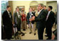 President Bush meets with Erik Weihenmeyer (far left), 32, of Golden, Colorado, and his friends to the Oval Office July 26, 2001. Mr. Weihenmeyer was the first blind person to reach the summit of Mount Everest May 25, 2001. After losing his sight to retinoscheses at the age of 13, he began rock climbing at the age of 16. White House photo by Paul Morse.