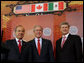 President George W. Bush, Mexico's President Felipe Calderon and Canadian Prime Minster Stephen Harper stand together at the conclusion of their joint news conference Tuesday, April 22, 2008, the last day of the 2008 North American Leaders' Summit in New Orleans. White House photo by Joyce N. Boghosian