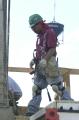 Arlington, VA, March 7, 2002 -- Construction workers continue work on top of the Pentagon. The reconstruction is a result of a terrorist attack on...