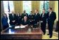 President George W. Bush signs HR 5467, The Department of Homeland Security Appropriations Act for the Fiscal Year 2005, in the Oval Office Monday, Oct. 18, 2004.  White House photo by Tina Hager