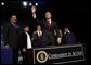 President George W. Bush waves to the audience after signing an executive order for equal protection of the laws for faith-based and community organizations in Philadelphia, Pa., Thursday, Dec. 12.  White House photo by Eric Draper