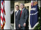 President George W. Bush stands with Judge John G. Roberts, his nominee to the Supreme Court, in the Rose Garden Wednesday morning, July 20, 2005, at the White House. White House photo by Eric Draper