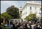 President George W. Bush welcomes the 2003 National and State Teachers of the Year during a ceremony in the East Garden Wednesday, April 30, 2003."I want to thank the teachers, who have traveled from all over the country, for being here today. Thank you for your dedication. Thank you for your hard and rewarding work. The 54 teachers we honor today deserve the respect and the gratitude of our entire nation. This is our way of thanking you all for your dedication, your service, and your love," President Bush said.  White House photo by Paul Morse