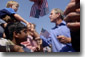 President George W. Bush greets the families of Michigan Teamster Union members during a Labor Day Barbecue at Teamsters Headquarters in Detroit, Michigan, Sept. 3, 2001. 