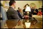 President George W. Bush and His Majesty King Abdullah of Jordan talk with reporters in the Oval Office Tuesday, March 15, 2004.  White House photo by Paul Morse