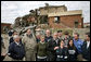 President George W. Bush talks with the media after walking through the tornado damage at Enterprise High School in Enterprise, Ala., Saturday, March 3, 2007. "And today I have walked through devastation that's hard to describe," said the President. "Our thoughts, of course, go out to the students who perished. We thank God for the hundreds who lived." White House photo by Paul Morse